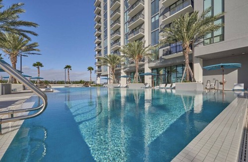 Tarpon River Apartment | High rise condo with balcony views and night life.