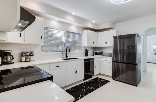Downtown Hollywood House | Historic bungalow, heated pool, cabana, arcade, on park, beach 5 min, dogs ok.