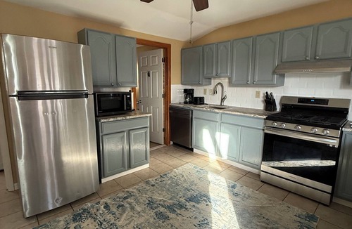 Wildwood House | Historic island home with modern charm. Pet friendly. Center of town on bayside.