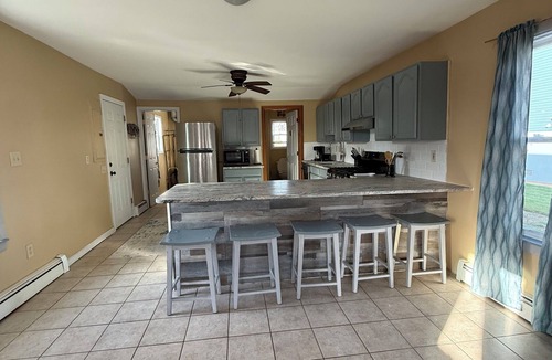 Wildwood House | Historic island home with modern charm. Pet friendly. Center of town on bayside.