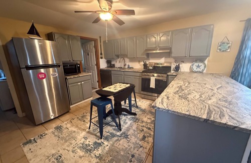 Wildwood House | Historic island home with modern charm. Pet friendly. Center of town on bayside.