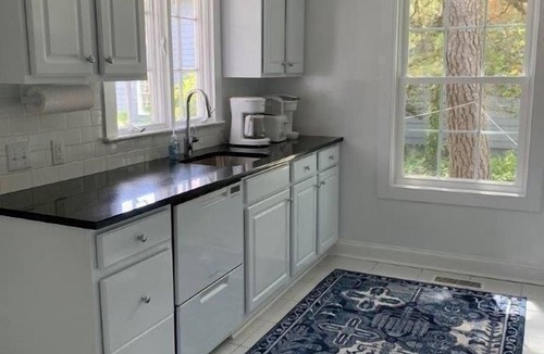 The Pines Cabin | Historic Pines Cottage Sleeps 10 – Walk to Beach, Porch, Patio, and Charm!