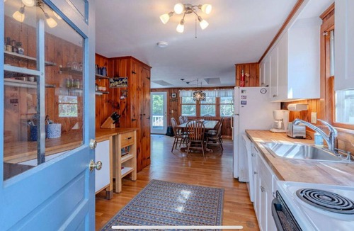 Indian Neck Heights House | Indian Neck 3BR on Quiet Road, Steps to the Beach, A/C, Fireplace