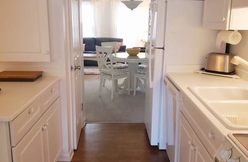 Chincoteague House | Island Escape - Townhouse - Enclosed back porch. NO LINENS