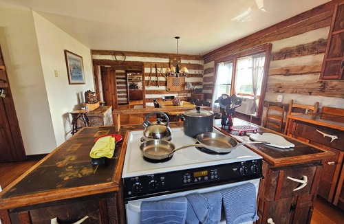 Winchester House | Just minutes from downtown Winchester, explore 62 scenic acres with roaming peacocks, horses, cows, and sheep. Enjoy a petting zoo or horse riding lessons for an unforgettable farm adventure!