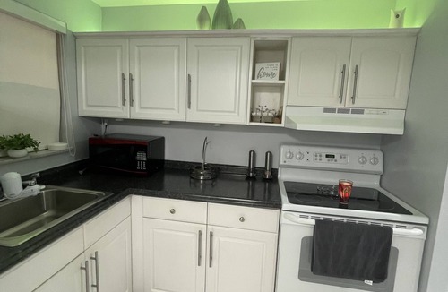 Sunrise Apartment | Kick back and relax in this calm, stylish space apartment with 1 bed 1 bath.