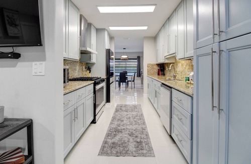 Miami Lakes House | Lake house with hot tub! Sunrise and sunset views!