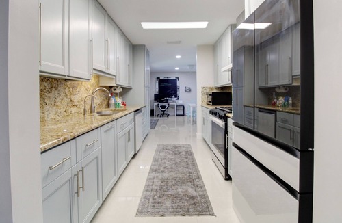 Miami Lakes House | Lake house with hot tub! Sunrise and sunset views!