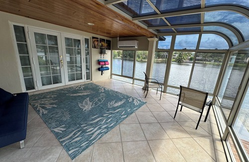 Miami Lakes House | Lakefront 5-bedroom, 4 bathroom home in tranquil Miami Lakes with Fitness room.