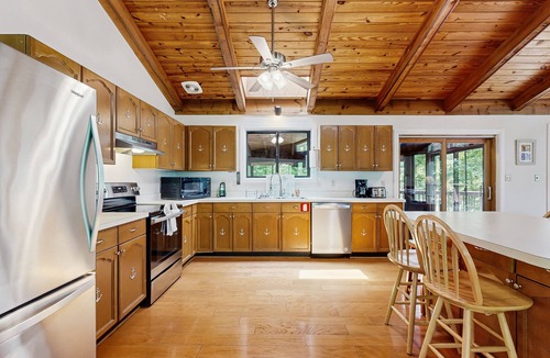 Blue Water House | Lakefront Escape with Private Docks, Three-Season Room, and Spacious Bunk Room