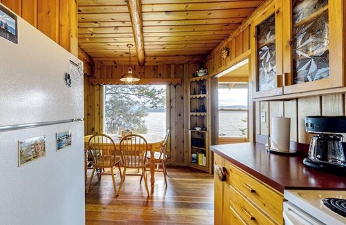 Lakeside Cabin | Lakefront home with amazing mountain views, wraparound deck, fireplace, & grill