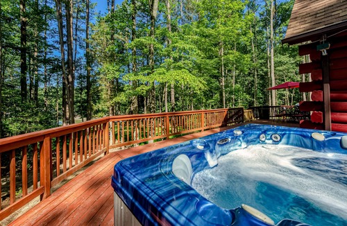 Bumpass House | Lakefront home with boat mooring, deck, hot tub, game room & fast WiFi - dogs OK