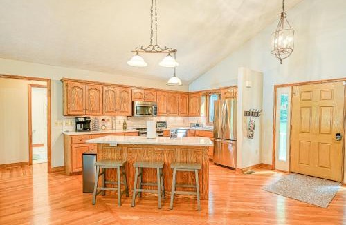 Livingston House | Lakefront home with deck, hot tub, game room, kayaks, & fireplace
