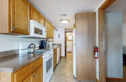 The Bays Cottage | Lakefront home with private beach, access to dock/fishing/kayaks/boat slip