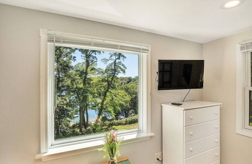 Orleans Condo | Lakefront retreat w/deck, dock, sandy beach, 4 watercraft, <6 mins to 2 beaches