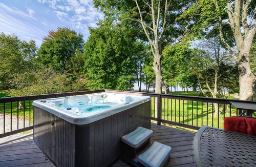 Bumpass House | Lakefront Retreat with Dock, Private Hot Tub, Central AC, and Private Beach