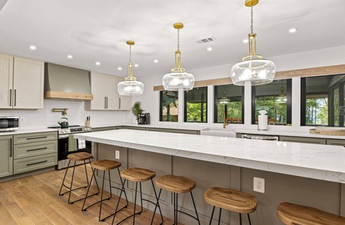 Lakeside Woods House | Lakeside Haven: Spacious Retreat with Stunning Views and Family Fun