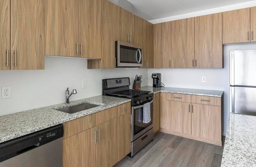 Carteret Apartment | Landing | Stylish 2BD, Courtyard, Gym