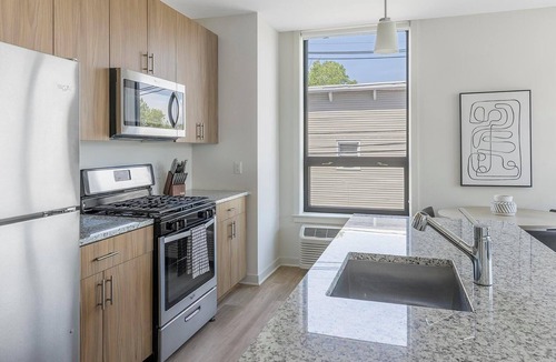 Carteret Apartment | Landing | Stylish 2BD, Gym, Courtyard