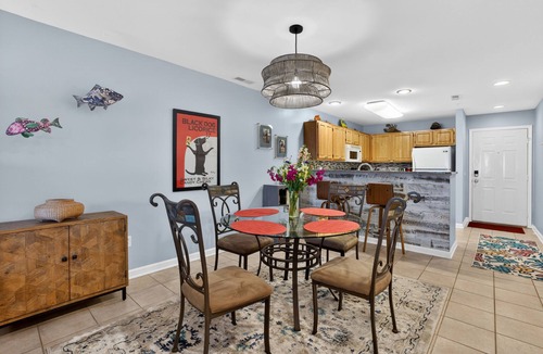 Rehoboth Beach Condo | Linens Coastal Ground Level Condo Sleeps 5 Pools Parking EV Charger