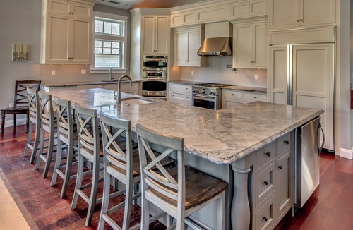 Stone Harbor House | Located just 1 ½ blocks to the beach, this distinctive property boasts seven (7) bedrooms, each with their own custom, private bath, as well as one powder room and an exquisite, solid mahogany, outdoor shower