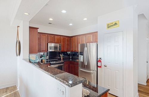 Sandbridge Condo | Luxe, 2-story condo with ocean views, balcony, fast WiFi & on-site pool/gym