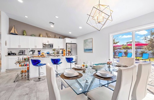 Delray Beach House | Luxe Heated Pool Home, Tiki Hut, Bar, Air Hockey!
