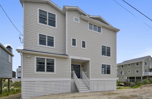 South Bethany House | Luxurious 7-Bedroom Oceanfront Rental in Bethany with Decks, Elevator, and More!