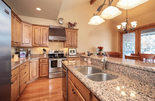 Bigfork Condo | Luxury Bigfork Retreat | Pond Views, Stone Fireplace & Steps from Flathead Lake | 30-Day Minimum