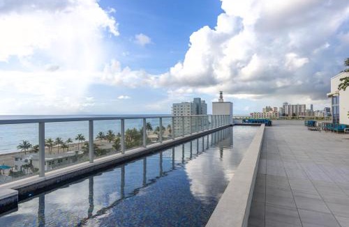 Hollywood Apartment | Luxury Condo with Serene Balcony View