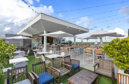 Hollywood Apartment | Luxury Condo with Serene Balcony View