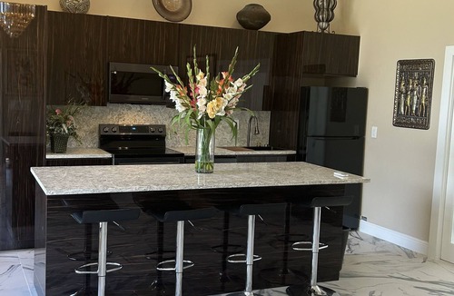 Hillsboro Pines House | Luxury Villa with full size washer and dryer within 5 miles of the beach
