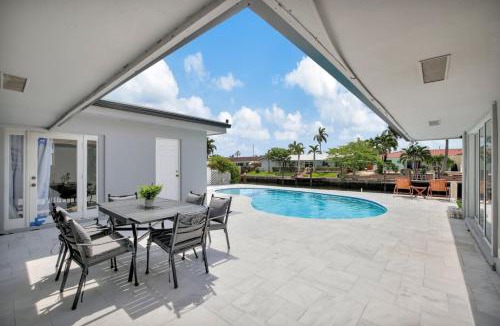 Coral Ridge Isles House | Luxury Waterfront Villa with Heated Pool and Dock