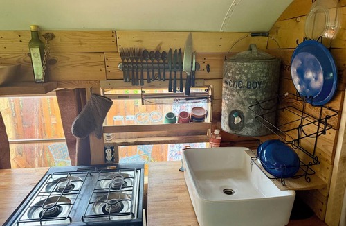 Martin City House | Magic School Bus in historic Martin City offers a memorable getaway