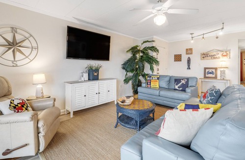 Ocean City Condo | Marlin marina-view getaway with pool & balcony - walk to pier & Jolly Roger