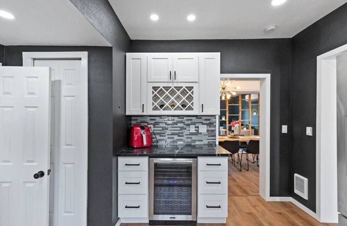 West Central House | Modern 2BR/2BA retreat for 6 with hot tub & stocked kitchen.