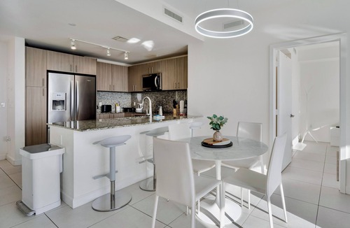 Doral Apartment | Modern 2BR Residence with open views & Balcony