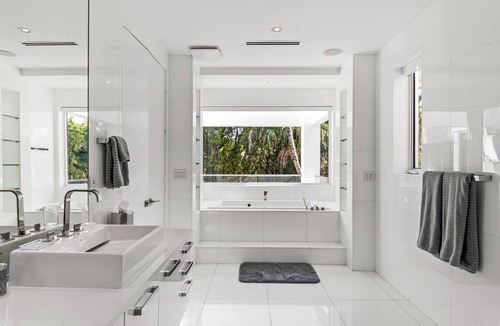 Lauderdale Beach House | Modern and luxuous Beach Mansion, heated salt water pool and spa.