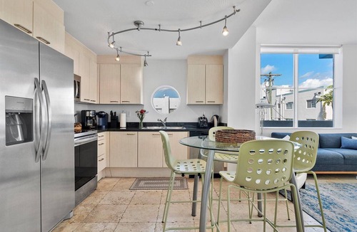 South of Fifth Condo | Modern Luxury Only Steps To The Sand! Huge Patio Deck, Modern Artwork & Extras