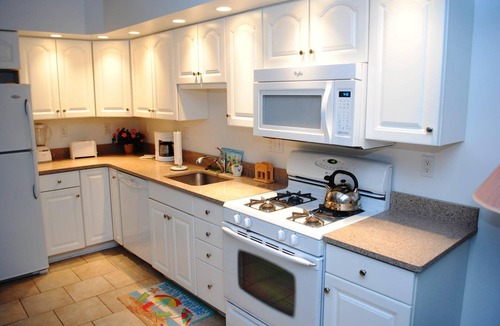 North Ocean City House | Modern, stylish 4 bedroom oceanfront end-unit townhouse with free WiFi, outdoor pool, playground, and downstairs apartment with gorgeous ocean view and only steps from beach!