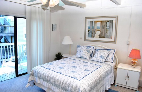 North Ocean City House | Modern, stylish 4 bedroom oceanfront end-unit townhouse with free WiFi, outdoor pool, playground, and downstairs apartment with gorgeous ocean view and only steps from beach!