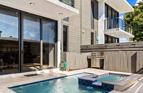 Coral Ridge House | Modern Two-Story Home| Coral Estate by Rove Travel