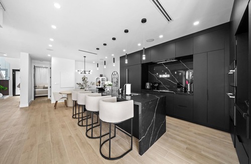 Buena Vista Villa | Modern Zen Oasis in Design District Sleeps 16