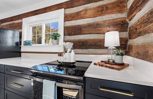 Afton House | Mountaintop Blue Ridge retreat | Hot tub, panoramic views, private putting green & hidden speakeasy