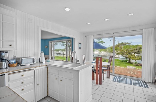 Harwich Port House | Nautical retreat with water views, inground heated pool, and private beach access