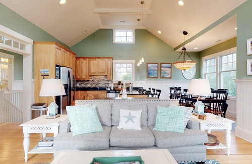 Cape Fear Station House | Nestled on a picket-fenced, private corner lot in prestigious Cape Fear Station