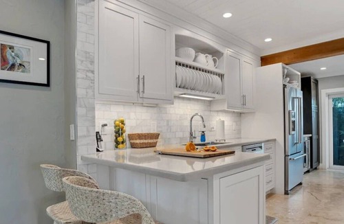 Dolphin Isles House | NEW LISTING! Tropical Beach Villa with Heated Pool and Spa