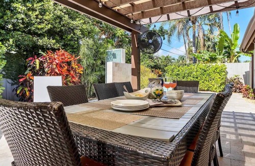 Dolphin Isles House | NEW LISTING! Tropical Beach Villa with Heated Pool and Spa