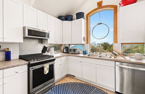 Carova Beach House | New To VRBO - Beautiful canal front with sound views & 4 en-suite bedrooms