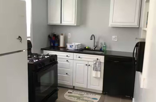 Northeast Virginia Beach Cottage | Next door to the Dome and Wave pool outdoor tiki bar with Dome in sight!